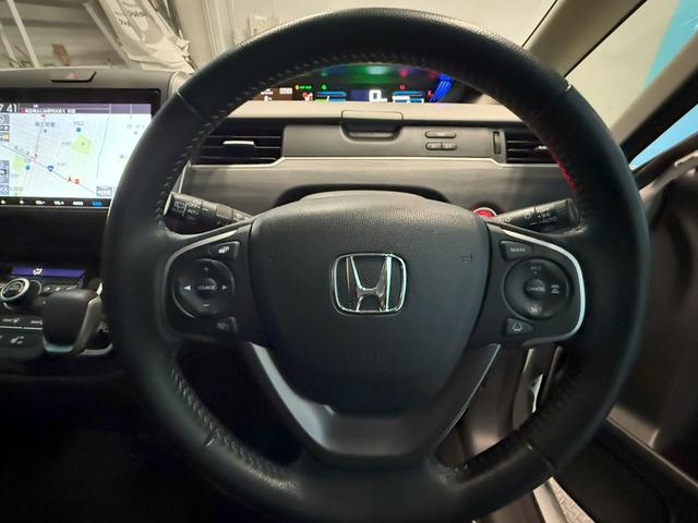フリードハイブリッド ハイブリッド・Ｇホンダセンシング　Ｓパッケージ、Ｃパッケージ、純正メモリーナビ、ＥＴＣ車載器、アダプティブクルーズコントロール、純正フロントドライブレコーダー、バックカメラ、純正アルミホイール、　フロントカメラ　軽減ブレーキ　記録簿（7枚目）