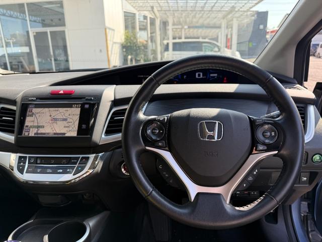 ジェイド ハイブリッドX ワンオーナー 純正ナビゲーション フルセグTV Bluetooth接続 バックカメラ ETC LEDヘッドライト 純正ドライブレコーダー スマキー 地デジフルセグ 踏み間違い防止装置 横滑り防止 AC(7枚目)