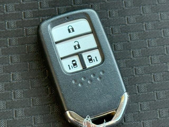 ステップワゴンスパーダ スパーダホンダセンシング 純正メモリーナビゲーション 両側電動スライドドア ETC車載器 LEDヘッドライト わくわくゲート 純正ドライブレコーダー 盗難防止 助手席エアバッグ Wパワスラ 記録簿有 リアオートエアコン USB(20枚目)