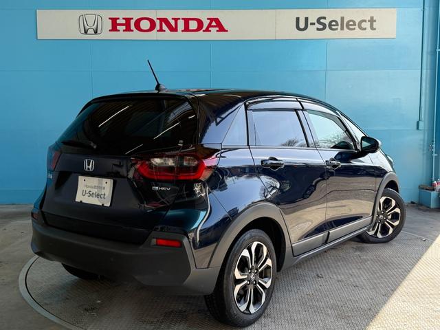 フィット ｅ：ＨＥＶクロスター　純正ナビゲーション　フルセグＴＶ　Ｂｌｕｅｔｏｏｔｈ接続　バックカメラ　ＥＴＣ　ＬＥＤヘッドライト　クリアランスソナー　スマートキー　衝突回避システム　フルオートエアコン　整備記録簿　前後センサー（2枚目）