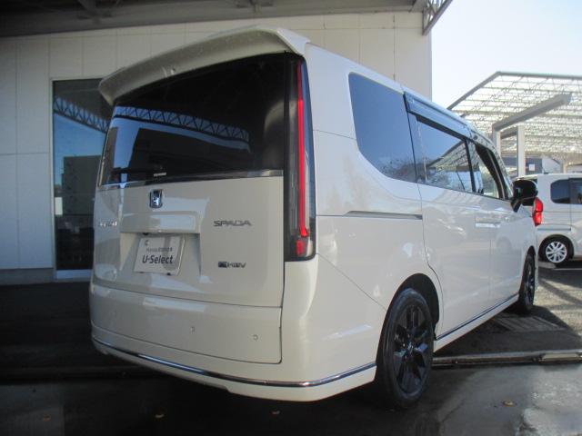 ステップワゴン ｅ：ＨＥＶスパーダ　ワンオーナー車　純正ナビゲーション　リアカメラ　フルセグＴＶ　左右パワースライドドア　フルオートエアコン　リアフリップダウンモニター　純正アルミホイール　スマートキー　１オーナー　ＥＳＣ　シートヒータ（2枚目）