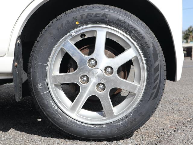 ハイゼットカーゴ デッキバン 5速MT 4WD エアコン パワステ ドアバイザー 純正流用14インチアルミ 夏タイヤ4本新品 スタッドレスタイヤ積込 車検記録簿 軽トラ(17枚目)