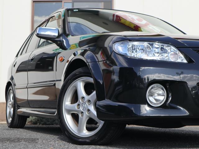 ファミリアＳ－ワゴン スポルト２０　ＤＶＤナビ　ＣＤＭＤ再生　ＥＴＣ　キーレス　純正ナルディステア　エアロ　リアスポイラー　ドアバイザー　純正１６インチアルミ　フロントフォグランプ　ディーラー整備記録簿　ワンオーナー（48枚目）