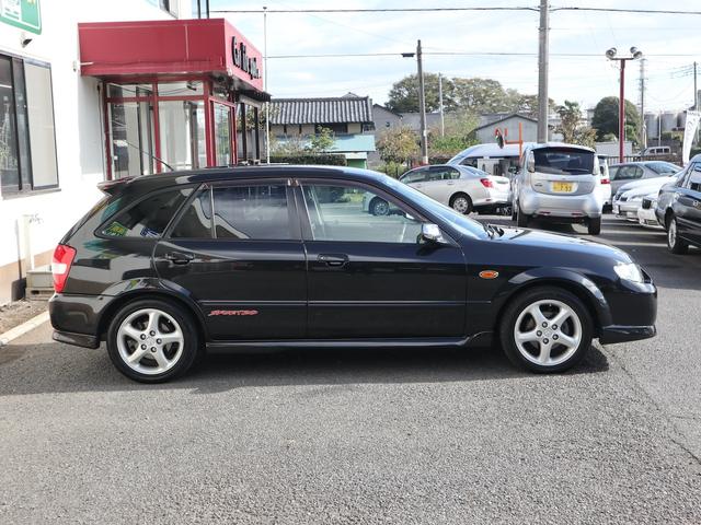 ファミリアＳ－ワゴン スポルト２０　ＤＶＤナビ　ＣＤＭＤ再生　ＥＴＣ　キーレス　純正ナルディステア　エアロ　リアスポイラー　ドアバイザー　純正１６インチアルミ　フロントフォグランプ　ディーラー整備記録簿　ワンオーナー（52枚目）