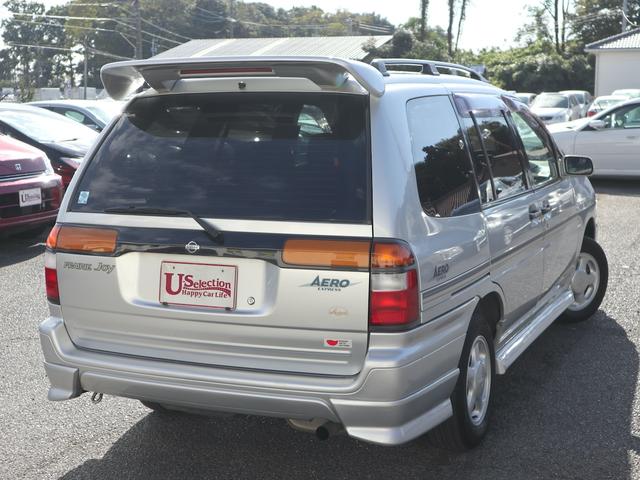 プレーリージョイ エアロエクスプレス　オーテック　専用フルエアロ　大型リアスポイラー　ルーフレール　ドアバイザー　純正１４インチアルミ　純正ＣＤオーディオ　３列シート　７人乗り　両側スライドドア　ＳＲ２０ＤＥエンジン　フルノーマル車（7枚目）