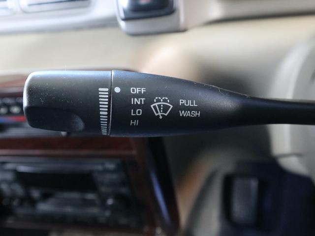 プレーリージョイ エアロエクスプレス　オーテック　専用フルエアロ　大型リアスポイラー　ルーフレール　ドアバイザー　純正１４インチアルミ　純正ＣＤオーディオ　３列シート　７人乗り　両側スライドドア　ＳＲ２０ＤＥエンジン　フルノーマル車（24枚目）