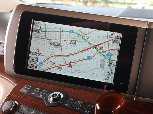 エルグランド ３５０ＸＬ　４ＷＤ　３列シート　７人乗り　両側電動スライドドア　Ｗサンルーフ　純正ナビ　ＣＤ／ＭＤ／ＤＶＤ／ＴＶ再生　バックカメラ　後席モニター　ＥＴＣ　スマートキー　ヒーター付ベージュ革シート　電動リアカーテン（27枚目）