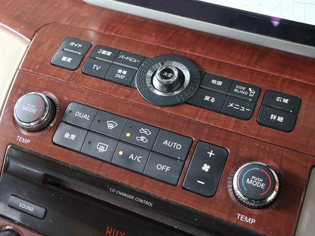 エルグランド ３５０ＸＬ　４ＷＤ　３列シート　７人乗り　両側電動スライドドア　Ｗサンルーフ　純正ナビ　ＣＤ／ＭＤ／ＤＶＤ／ＴＶ再生　バックカメラ　後席モニター　ＥＴＣ　スマートキー　ヒーター付ベージュ革シート　電動リアカーテン（30枚目）