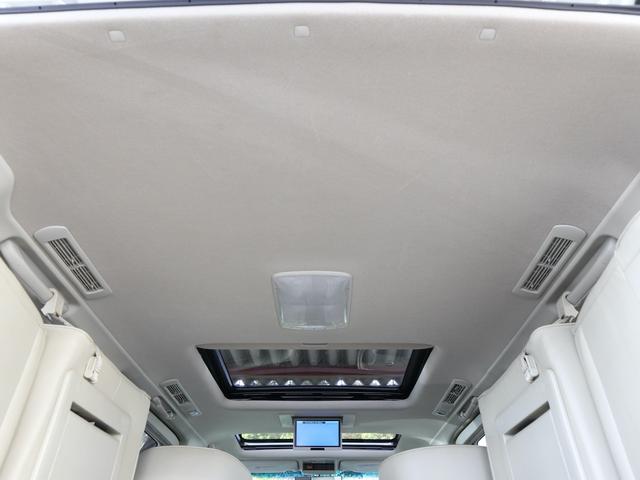 エルグランド ３５０ＸＬ　４ＷＤ　３列シート　７人乗り　両側電動スライドドア　Ｗサンルーフ　純正ナビ　ＣＤ／ＭＤ／ＤＶＤ／ＴＶ再生　バックカメラ　後席モニター　ＥＴＣ　スマートキー　ヒーター付ベージュ革シート　電動リアカーテン（49枚目）