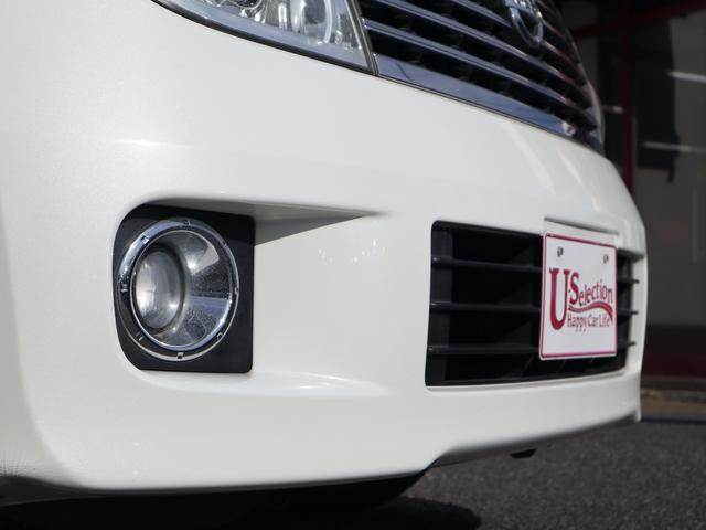 エルグランド ３５０ＸＬ　４ＷＤ　３列シート　７人乗り　両側電動スライドドア　Ｗサンルーフ　純正ナビ　ＣＤ／ＭＤ／ＤＶＤ／ＴＶ再生　バックカメラ　後席モニター　ＥＴＣ　スマートキー　ヒーター付ベージュ革シート　電動リアカーテン（52枚目）