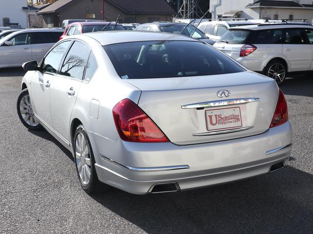 ティアナ アクシス　後期型　アクシス専用外装　専用１７インチアルミ　純正ＤＶＤナビ　ＣＤ再生　バックカメラ　ＥＴＣ　スマートキー　ＨＩＤライト　黒革シート　パワーシート　助手席オットマン　ワンオーナー（8枚目）