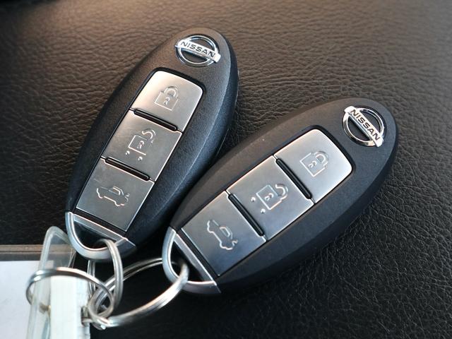 ティアナ アクシス　後期型　アクシス専用外装　専用１７インチアルミ　純正ＤＶＤナビ　ＣＤ再生　バックカメラ　ＥＴＣ　スマートキー　ＨＩＤライト　黒革シート　パワーシート　助手席オットマン　ワンオーナー（24枚目）