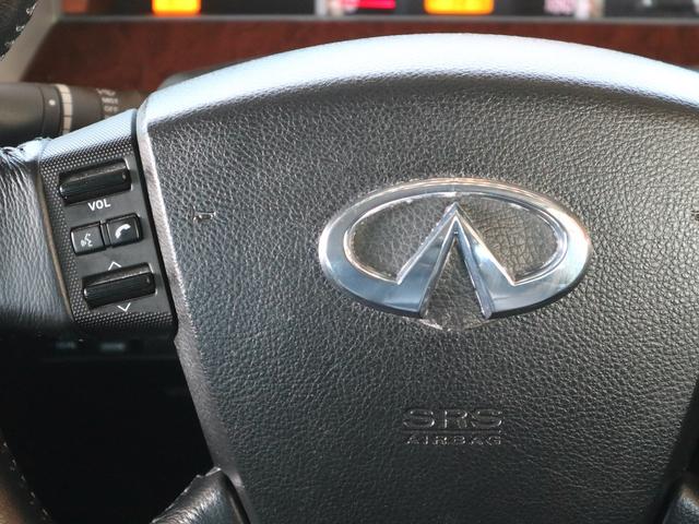 ティアナ アクシス　後期型　アクシス専用外装　専用１７インチアルミ　純正ＤＶＤナビ　ＣＤ再生　バックカメラ　ＥＴＣ　スマートキー　ＨＩＤライト　黒革シート　パワーシート　助手席オットマン　ワンオーナー（26枚目）