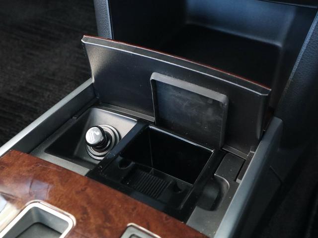 ティアナ アクシス　後期型　アクシス専用外装　専用１７インチアルミ　純正ＤＶＤナビ　ＣＤ再生　バックカメラ　ＥＴＣ　スマートキー　ＨＩＤライト　黒革シート　パワーシート　助手席オットマン　ワンオーナー（30枚目）