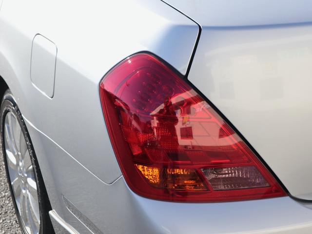 ティアナ アクシス　後期型　アクシス専用外装　専用１７インチアルミ　純正ＤＶＤナビ　ＣＤ再生　バックカメラ　ＥＴＣ　スマートキー　ＨＩＤライト　黒革シート　パワーシート　助手席オットマン　ワンオーナー（51枚目）