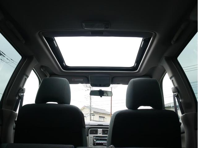 XT 1年保証付 5速MT サンルーフ EJ20ターボ 4WD ハーフレザーシート MOMOステ オートエアコン 純正16AW ルーフスポイラー 電動格納ミラー キーレス HID(64枚目)
