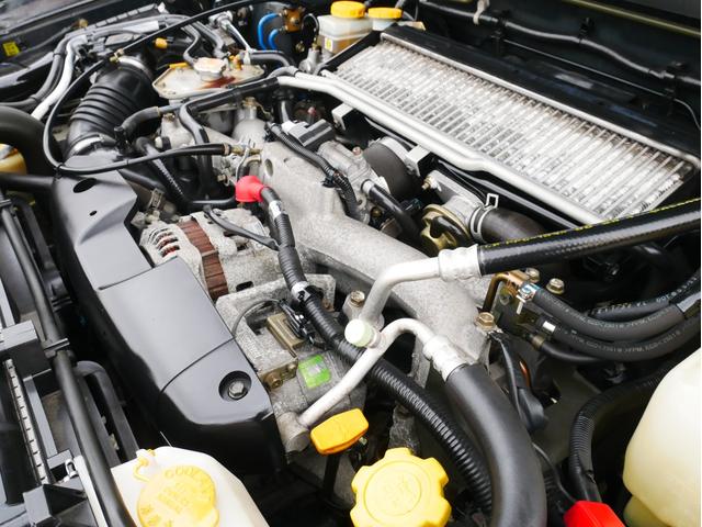 XT 1年保証付 5速MT サンルーフ EJ20ターボ 4WD ハーフレザーシート MOMOステ オートエアコン 純正16AW ルーフスポイラー 電動格納ミラー キーレス HID(67枚目)