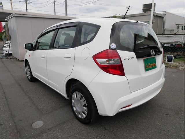 フィット G 5速MT 27014KM キーレス 電動ミラー ライトレベライザー サイドバイザー パワステ パワーウィンドウ Wエアバック ABS タイミングチェーン 1年保証付(22枚目)