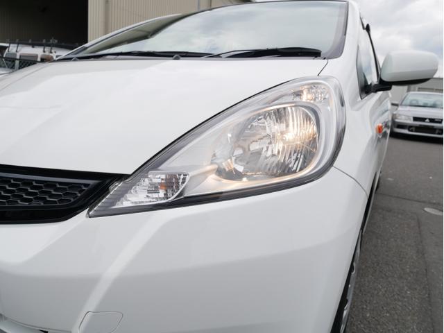 フィット G 5速MT 27014KM キーレス 電動ミラー ライトレベライザー サイドバイザー パワステ パワーウィンドウ Wエアバック ABS タイミングチェーン 1年保証付(30枚目)