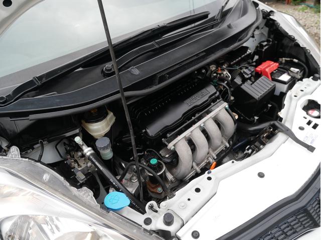 フィット G 5速MT 27014KM キーレス 電動ミラー ライトレベライザー サイドバイザー パワステ パワーウィンドウ Wエアバック ABS タイミングチェーン 1年保証付(58枚目)