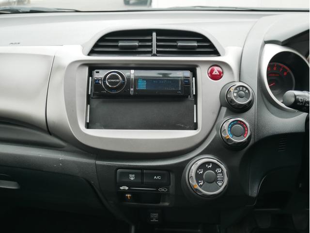 フィット G 5速MT 27014KM キーレス 電動ミラー ライトレベライザー サイドバイザー パワステ パワーウィンドウ Wエアバック ABS タイミングチェーン 1年保証付(60枚目)