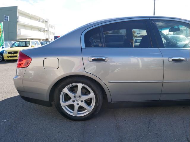 スカイライン 350GT 6速MT タイミングチェーン メモリーナビ DVD再生 ワンセグ ETC 純正17AW 電格ミラー オートライトHID チルトハンドル オートエアコン Wエアバック ABS トランクスルー(26枚目)