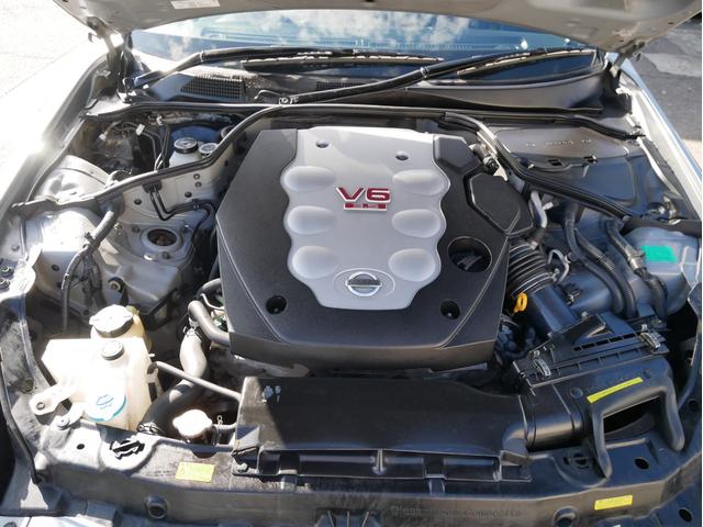 スカイライン 350GT 6速MT タイミングチェーン メモリーナビ DVD再生 ワンセグ ETC 純正17AW 電格ミラー オートライトHID チルトハンドル オートエアコン Wエアバック ABS トランクスルー(58枚目)