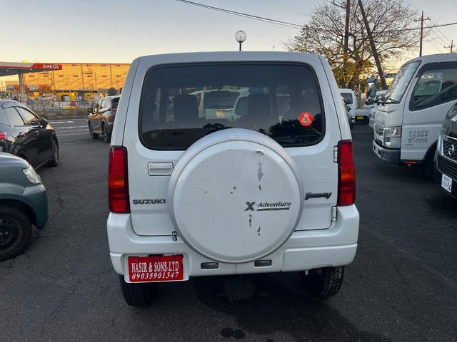 ジムニー クロスアドベンチャー パワーステアリング パワーウィンドウ エアバッグ エアコン キーレス 4WD ターボ ETC フォグランプ 社外AW(3枚目)