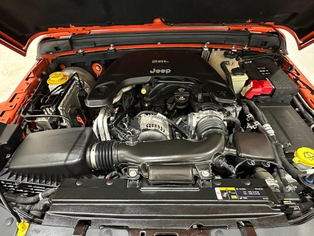 ジープ・ラングラーアンリミテッド サハラ　ローンチエディション　１年保証付／正規ディーラー車／フルセグ／黒革ヒーター／Ｃａｒｐｌａｙ／ステアリングヒーター／ＥＴＣ／前後ソナー／ＰＵＳＨスタート／Ｂｌｕｅｔｏｏｔｈ＆ＵＳＢ／ＢＳＭ／バックカメラ／純正１８ｉｎｃｈＡＷ（56枚目）