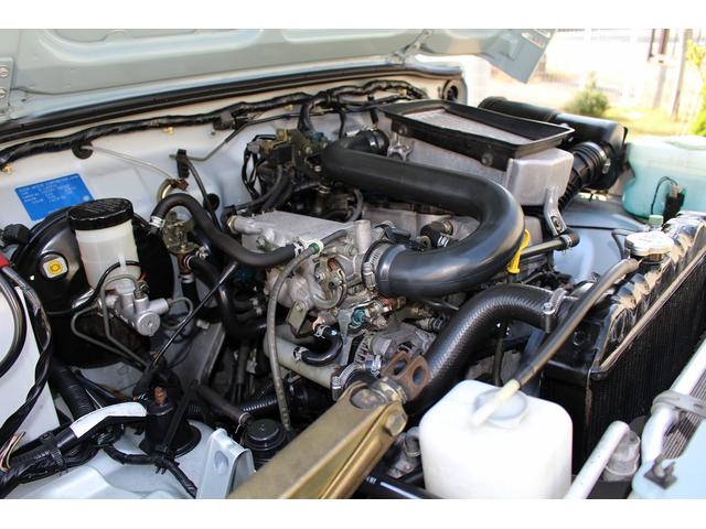 ワイルドウインド JA22最終2型 特別仕様車 アンヴィルグレー/ホワイトルーフ色替車 リフトアップ改 グロスブラック16インチAW GRANDTREK.M/Tタイヤ レトロスタイル新品シートカバー(79枚目)