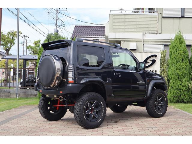 ジムニー ランドベンチャー　ユーザー様買取車　特別仕様車　ＭＡＲＶＩＮショートバンパー　ＤＩＲＴ－ＸＣ１６ＡＷ　ＲＰＧリフトアップ　ＷｉｒｕｓＷｉｎマフラー　ＢＡＤフェイスヘッドライト　ＬＥＤサンダーテール　ＳｔｒａｄａナビＴＶ（12枚目）