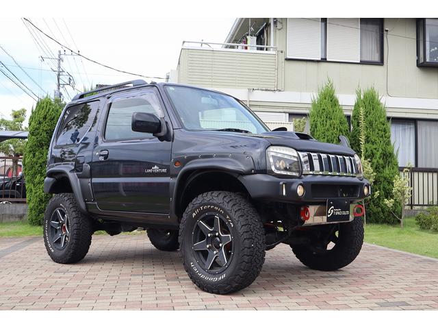 ジムニー ランドベンチャー　ユーザー様買取車　特別仕様車　ＭＡＲＶＩＮショートバンパー　ＤＩＲＴ－ＸＣ１６ＡＷ　ＲＰＧリフトアップ　ＷｉｒｕｓＷｉｎマフラー　ＢＡＤフェイスヘッドライト　ＬＥＤサンダーテール　ＳｔｒａｄａナビＴＶ（65枚目）