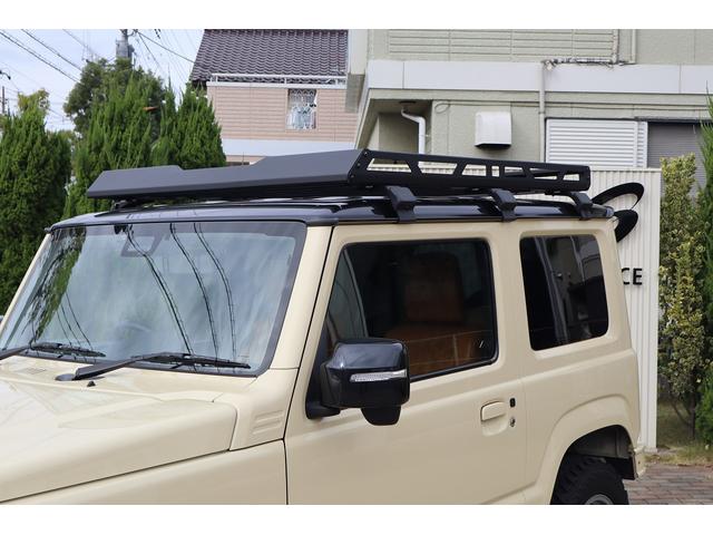 ジムニー ＸＣ　ワンオーナー禁煙車　スズキセーフティサポート　ＤＡＭＤ．リトルｂ前後バンパー　ＤＥＡＮ１６インチＡＷ　ＧＥＯＬＡＮＤＡＲ．Ｍ／Ｔタイヤ　ルーフラック　メモリーナビフルセグＢカメラ　レザー調シートカバー（5枚目）