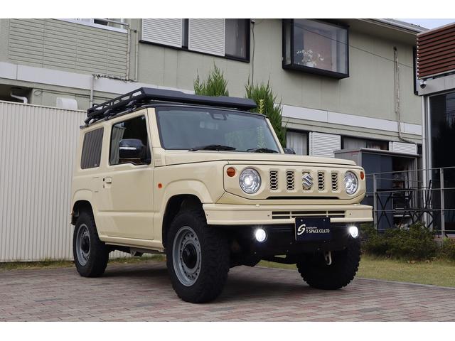 ジムニー ＸＣ　ワンオーナー禁煙車　スズキセーフティサポート　ＤＡＭＤ．リトルｂ前後バンパー　ＤＥＡＮ１６インチＡＷ　ＧＥＯＬＡＮＤＡＲ．Ｍ／Ｔタイヤ　ルーフラック　メモリーナビフルセグＢカメラ　レザー調シートカバー（7枚目）