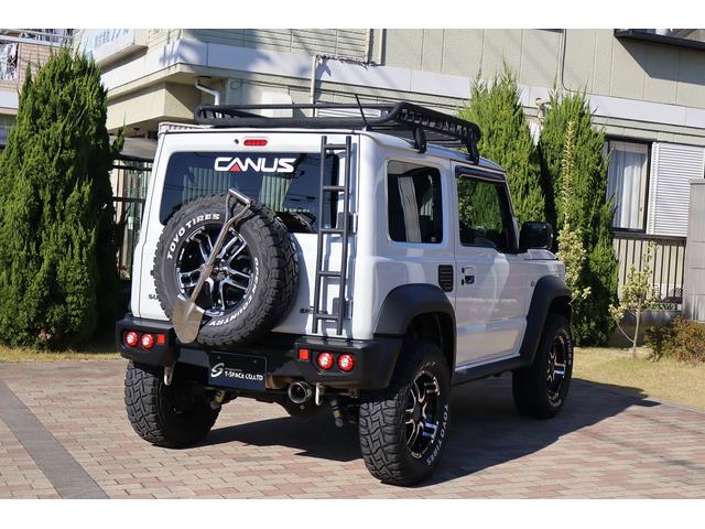 ジムニーシエラ ＪＣ　ＪＡＯＳスポーツカウル　スキッドプレート　丸型ＬＥＤテール　ＢＡＴＴＬＥＺマフラー　ＭＫＷ１６インチＡＷ　ＯＰＥＮＣＯＵＮＴＲＹ．Ｒ／Ｔタイヤ　ＣＡＮＵＳリフトアップ車高調　　ルーフラック　リアラダー（65枚目）