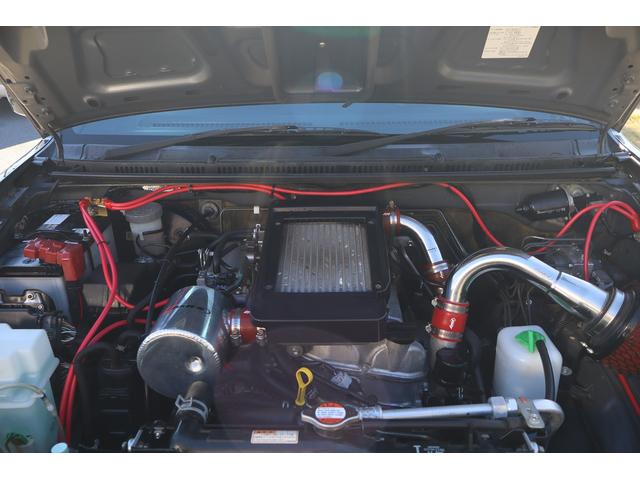 ジムニー ランドベンチャー　ＪＢ２３最終１０型　特別仕様車　社外ショートバンパー　リフトアップ　社外１６ＡＷ　ＢＦグッドリッチＭ／Ｔタイヤ　社外マフラー　ＲＡＮＣＨＯステアリングダンパー　ラテラルロッド　メモリーナビフルセグ（19枚目）