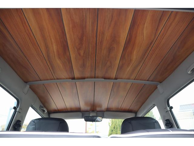 ジムニー ワイルドウインド　チューブバンパー／ボディリフトアップ／ボディ同色１６インチアルミ／ブラックレザー調ヴィンテージシートカバー／天張り＆ドアトリムウッド張替カスタム（52枚目）