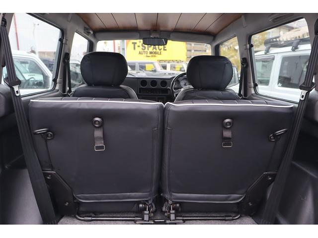 ジムニー ワイルドウインド　チューブバンパー／ボディリフトアップ／ボディ同色１６インチアルミ／ブラックレザー調ヴィンテージシートカバー／天張り＆ドアトリムウッド張替カスタム（56枚目）