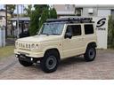 ジムニー ＸＣ　ワンオーナー禁煙車　スズキセーフティサポート　ＤＡＭＤ．リトルｂ前後バンパー　ＤＥＡＮ１６インチＡＷ　ＧＥＯＬＡＮＤＡＲ．Ｍ／Ｔタイヤ　ルーフラック　メモリーナビフルセグＢカメラ　レザー調シートカバー（4枚目）