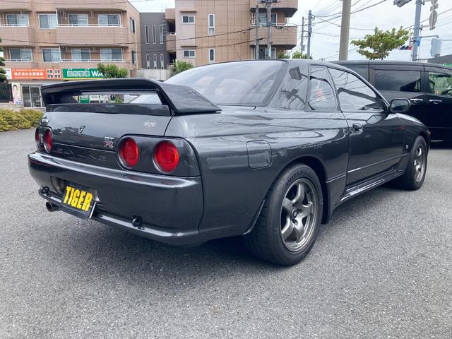 スカイライン ＧＴ－Ｒニスモ　５００台限定　１６インチ純正ＡＷ　ＨＫＳ車高調　ニスモタワーバー　ｔａｎａｂｅリアタワーバー　社外キャタライザー　記録簿　ＩＭＰＵＬ３００キロメーター　ニスモ専用エアロ　チビスポ　社外ステアリング（10枚目）