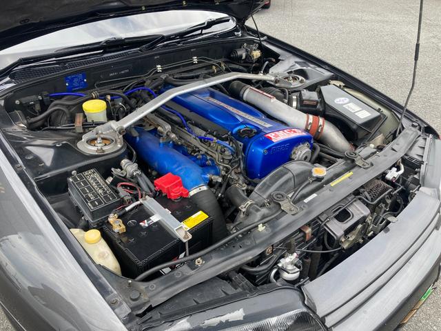スカイライン ＧＴ－Ｒニスモ　５００台限定　１６インチ純正ＡＷ　ＨＫＳ車高調　ニスモタワーバー　ｔａｎａｂｅリアタワーバー　社外キャタライザー　記録簿　ＩＭＰＵＬ３００キロメーター　ニスモ専用エアロ　チビスポ　社外ステアリング（48枚目）