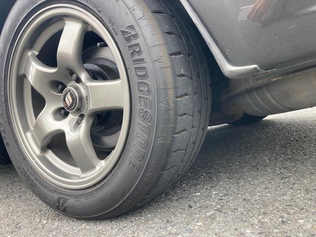 スカイライン ＧＴ－Ｒニスモ　５００台限定　１６インチ純正ＡＷ　ＨＫＳ車高調　ニスモタワーバー　ｔａｎａｂｅリアタワーバー　社外キャタライザー　記録簿　ＩＭＰＵＬ３００キロメーター　ニスモ専用エアロ　チビスポ　社外ステアリング（68枚目）