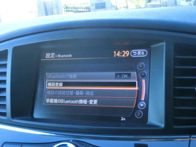 エルグランド ２５０ハイウェイスター　両側スライド片側電動スライドドア　純正ナビ　テレビ　ＤＶＤ　バックカメラ　Ｂｌｕｅｔｏｏｔｈオーディオ　フリップダウンモニター　スマートキー　純正ＡＷ（12枚目）