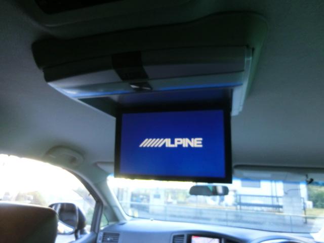 エルグランド 250ハイウェイスターアーバンクロム 両側電動スライドドア アルパインナビ テレビ DVD フリップダウンモニター バックカメラ HID スマートキー ハーフレザーシート オットマン 純正AW(12枚目)