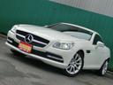 ＳＬＫ ＳＬＫ２００ブルーエフィシェンシ１ｓｔアニバーサリー　電動バリオルーフ動作チェック済み　純正ナビ　Ｂｌｕｅｔｏｏｔｈオーディオ　黒革シート　シートヒーター　純正ＡＷ（7枚目）