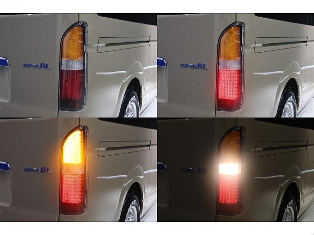 ハイエースバン ロングスーパーGL アースカラーパッケージ ベージュ ガソリン2WD 角目フェイス クラシックテール カリフォルニア16インチAW ナスカータイヤ アルパインナビ 茶木目インパネ ベッドキット シートカバー ETCPVM(7枚目)