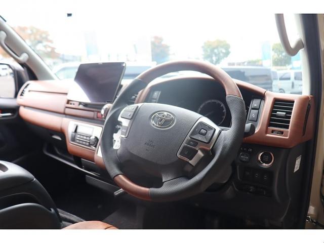 ハイエースバン ロングスーパーGL アースカラーパッケージ ベージュ ガソリン2WD 角目フェイス クラシックテール カリフォルニア16インチAW ナスカータイヤ アルパインナビ 茶木目インパネ ベッドキット シートカバー ETCPVM(10枚目)