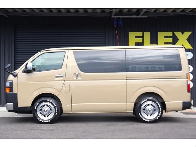 ハイエースバン ロングスーパーGL アースカラーパッケージ ベージュ ガソリン2WD 角目フェイス クラシックテール カリフォルニア16インチAW ナスカータイヤ アルパインナビ 茶木目インパネ ベッドキット シートカバー ETCPVM(17枚目)