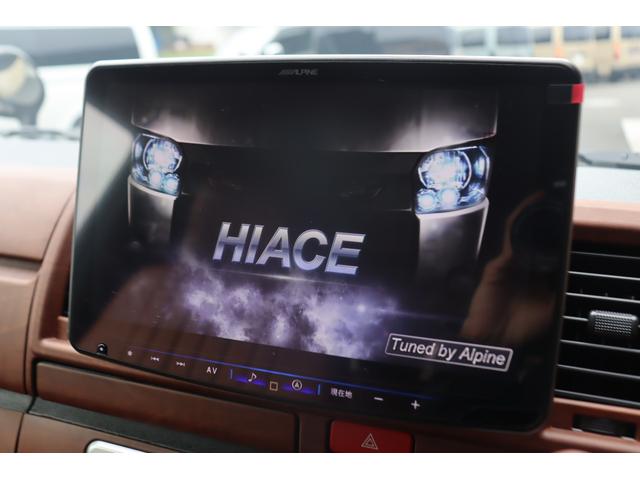 ハイエースバン ロングスーパーGL アースカラーパッケージ ベージュ ガソリン2WD 角目フェイス クラシックテール カリフォルニア16インチAW ナスカータイヤ アルパインナビ 茶木目インパネ ベッドキット シートカバー ETCPVM(44枚目)
