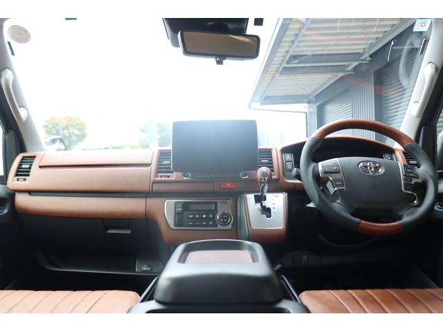 ハイエースバン ロングスーパーGL アースカラーパッケージ ベージュ ガソリン2WD 角目フェイス クラシックテール カリフォルニア16インチAW ナスカータイヤ アルパインナビ 茶木目インパネ ベッドキット シートカバー ETCPVM(48枚目)